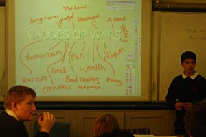 Interactive Whiteboard and Causes of War in classroom session